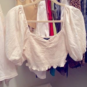 Cream crop with puffy sleeves
